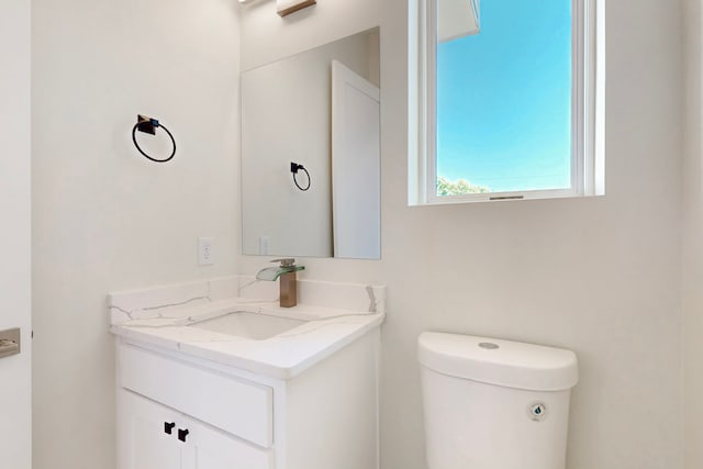 1021 Mobile St, Dallas, TX 75208 - half bath featuring vanity and toilet