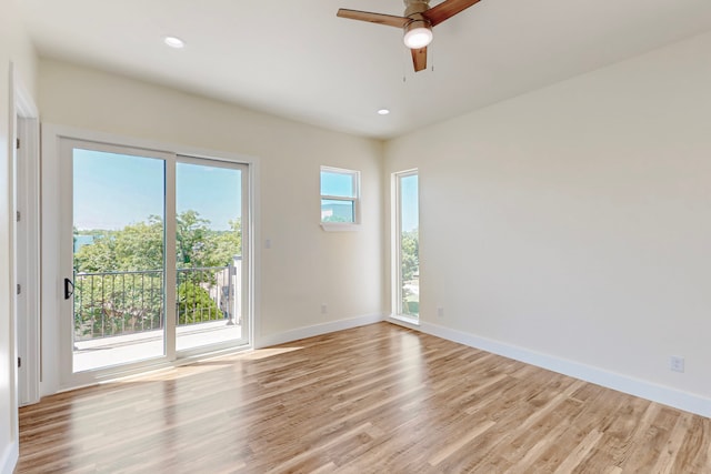 1021 Mobile St, Dallas, TX 75208 - unfurnished room featuring light wood-style floors, a ceiling fan, baseboards, and recessed lighting