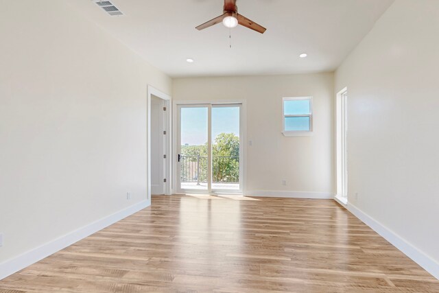 1021 Mobile St, Dallas, TX 75208 - spare room with ceiling fan, baseboards, light wood-style flooring, and recessed lighting