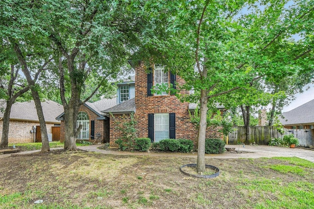 9228 Winslow Ct, North Richland Hills, TX 76182 - traditional-style house featuring brick siding and a shingled roof