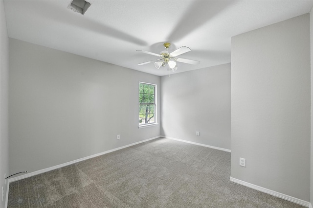 9228 Winslow Ct, North Richland Hills, TX 76182 - carpeted empty room with a ceiling fan and baseboards