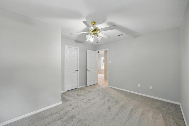 9228 Winslow Ct, North Richland Hills, TX 76182 - spare room featuring ceiling fan, baseboards, and carpet floors