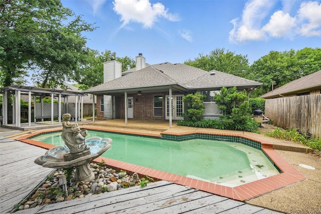9228 Winslow Ct, North Richland Hills, TX 76182 - view of pool featuring a pergola, a deck, and a patio