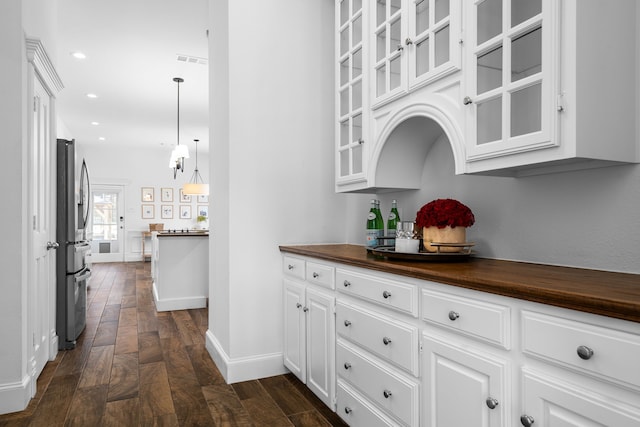 306 Stonecrest Rd, Argyle, TX 76226 - bar featuring stainless steel refrigerator with ice dispenser, dark wood-style flooring, baseboards, recessed lighting, and decorative light fixtures