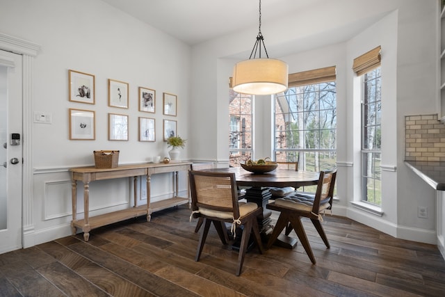 306 Stonecrest Rd, Argyle, TX 76226 - dining room with plenty of natural light, dark wood-style floors, and baseboards