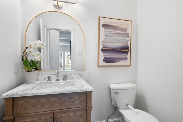 306 Stonecrest Rd, Argyle, TX 76226 - bathroom featuring vanity and toilet