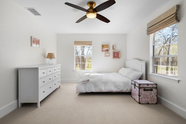 306 Stonecrest Rd, Argyle, TX 76226 - bedroom featuring light carpet, baseboards, and a ceiling fan