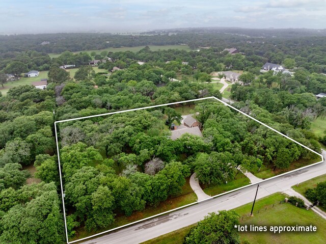 306 Stonecrest Rd, Argyle, TX 76226 - view of property location with property parcel outlined and a heavily wooded area
