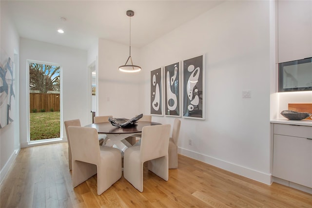 8506 Craighill Ave, Dallas, TX 75209 - dining area featuring light wood-style floors, baseboards, and recessed lighting