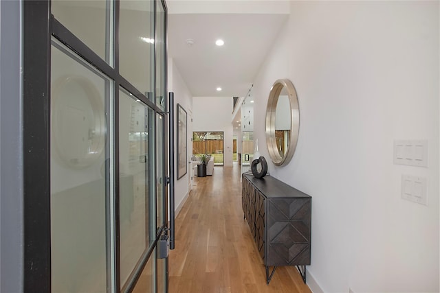 8506 Craighill Ave, Dallas, TX 75209 - corridor with light wood-style floors, recessed lighting, and baseboards