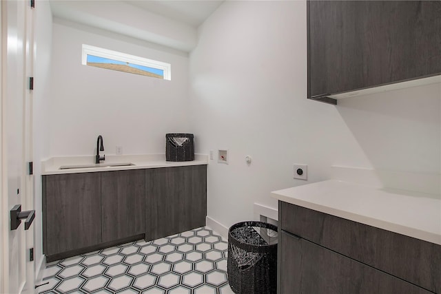 8506 Craighill Ave, Dallas, TX 75209 - laundry area with cabinet space, hookup for an electric dryer, washer hookup, and baseboards