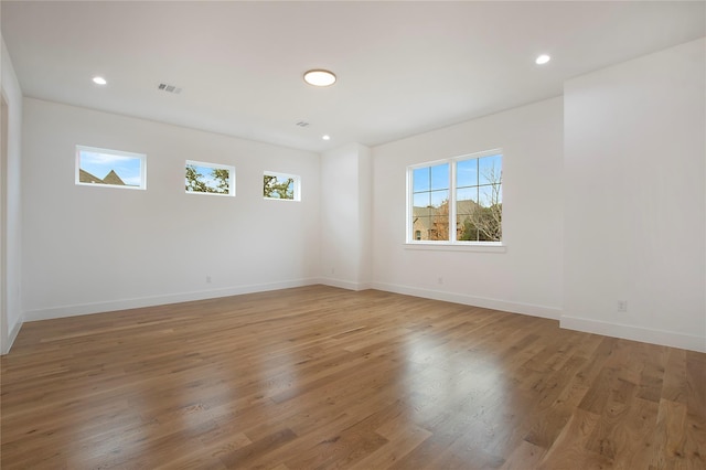 8506 Craighill Ave, Dallas, TX 75209 - empty room with plenty of natural light, light wood-type flooring, baseboards, and recessed lighting