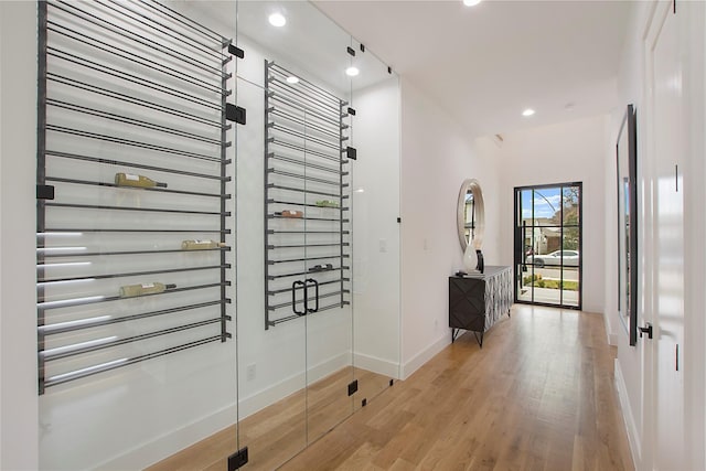8506 Craighill Ave, Dallas, TX 75209 - corridor featuring baseboards, wood finished floors, and recessed lighting