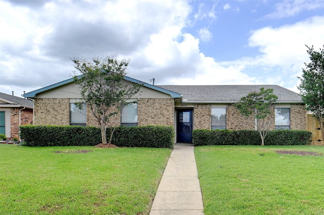 4629 Las Hadas, Mesquite, TX 75150 - ranch-style home with brick siding and a front yard