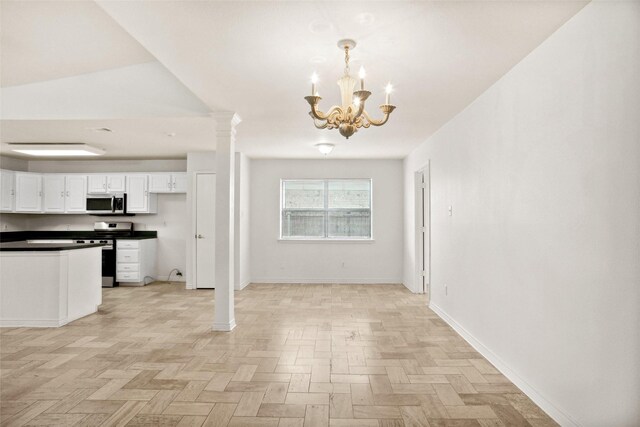 4629 Las Hadas, Mesquite, TX 75150 - unfurnished dining area with a chandelier, baseboards, and ornate columns