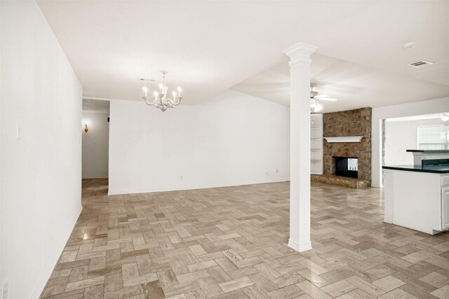 4629 Las Hadas, Mesquite, TX 75150 - unfurnished living room with a chandelier, a fireplace, and ceiling fan