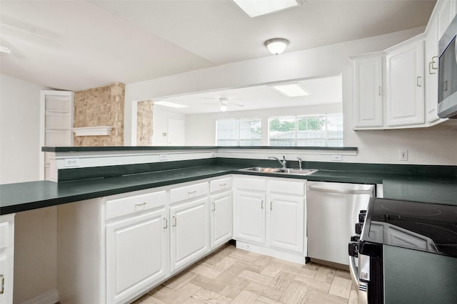 4629 Las Hadas, Mesquite, TX 75150 - kitchen featuring a sink, stainless steel electric range, dishwashing machine, and dark countertops