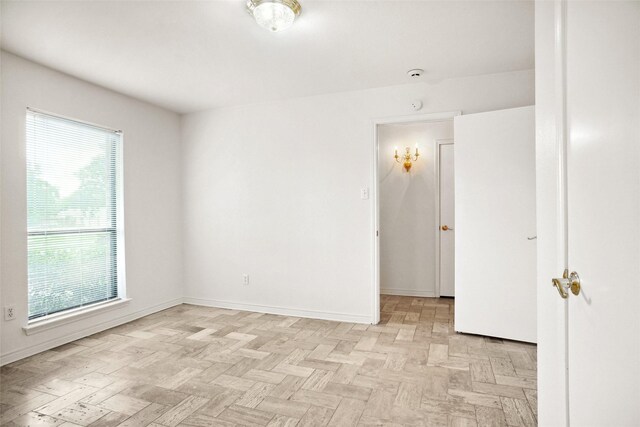 4629 Las Hadas, Mesquite, TX 75150 - empty room with baseboards and a smoke detector