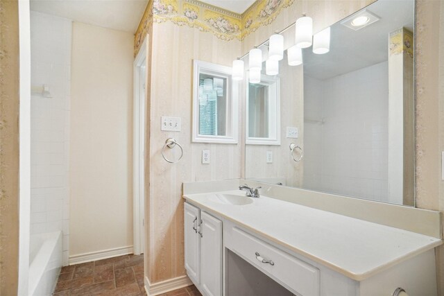4629 Las Hadas, Mesquite, TX 75150 - bathroom with vanity, stone finish floors, and baseboards