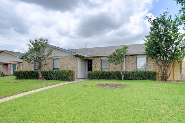 4629 Las Hadas, Mesquite, TX 75150 - single story home with brick siding, a front lawn, and a shingled roof