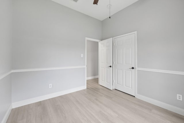 9718 Prestmont Pl, Frisco, TX 75035 - unfurnished bedroom featuring wood finished floors, baseboards, and ceiling fan