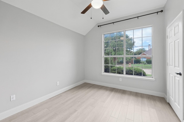 9718 Prestmont Pl, Frisco, TX 75035 - spare room with ceiling fan, vaulted ceiling, baseboards, and light wood-style floors