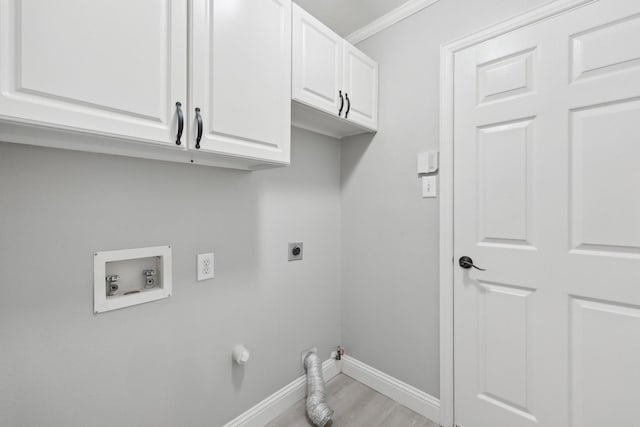 9718 Prestmont Pl, Frisco, TX 75035 - laundry room featuring gas dryer hookup, washer hookup, cabinet space, electric dryer hookup, and baseboards