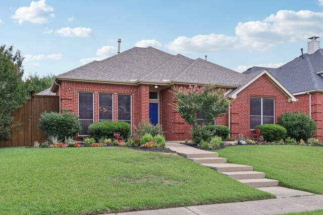 9718 Prestmont Pl, Frisco, TX 75035 - view of front of house with a shingled roof and brick siding