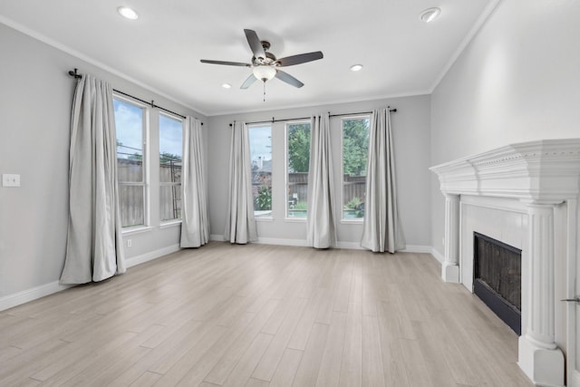 9718 Prestmont Pl, Frisco, TX 75035 - unfurnished living room featuring plenty of natural light, ceiling fan, light wood-style flooring, ornamental molding, and baseboards