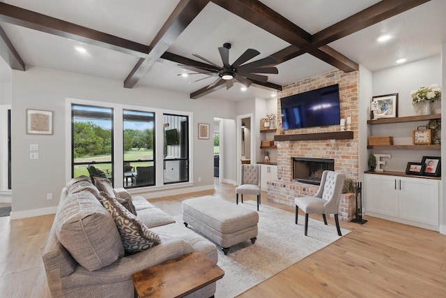 1020 Sky Rd, Weatherford, TX 76087 - living area with light wood-type flooring, coffered ceiling, beam ceiling, baseboards, and a fireplace