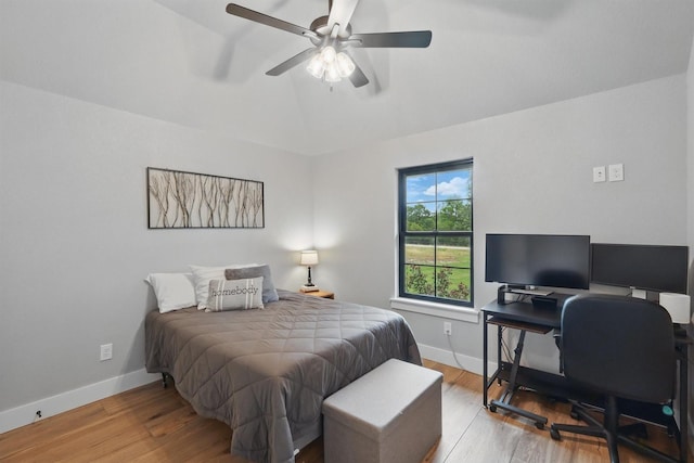 1020 Sky Rd, Weatherford, TX 76087 - bedroom featuring lofted ceiling, wood finished floors, baseboards, a desk, and ceiling fan