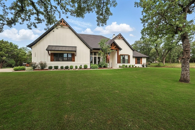 1020 Sky Rd, Weatherford, TX 76087 - modern inspired farmhouse with a standing seam roof, board and batten siding, a front lawn, and metal roof