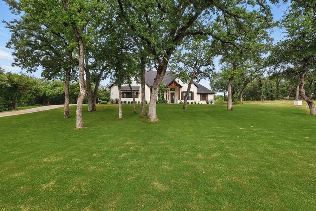 1020 Sky Rd, Weatherford, TX 76087 - view of front of house featuring a front lawn
