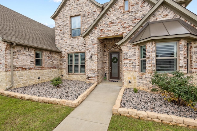 3723 Parkwood Ln, Denison, TX 75020 - view of front of house featuring a shingled roof and stone siding