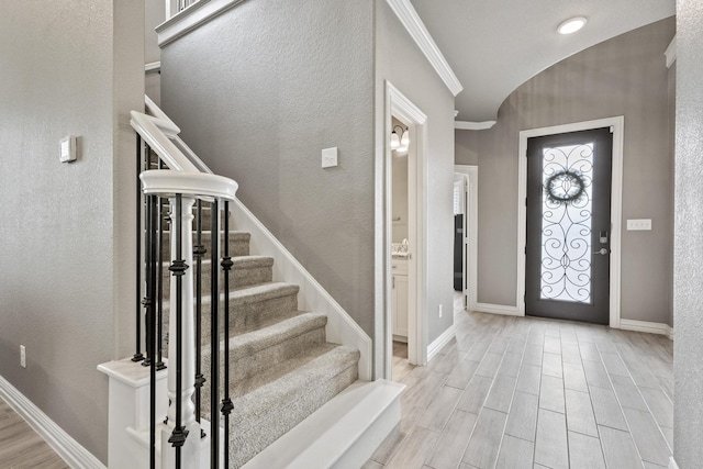 3723 Parkwood Ln, Denison, TX 75020 - entryway with stairway, light wood-style floors, baseboards, and ornamental molding