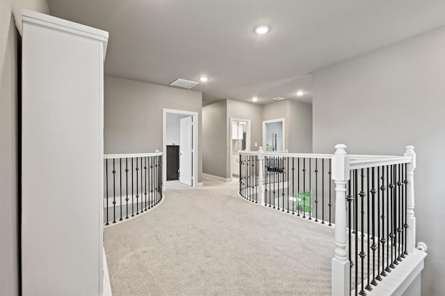 3723 Parkwood Ln, Denison, TX 75020 - hall with an upstairs landing, carpet floors, and recessed lighting