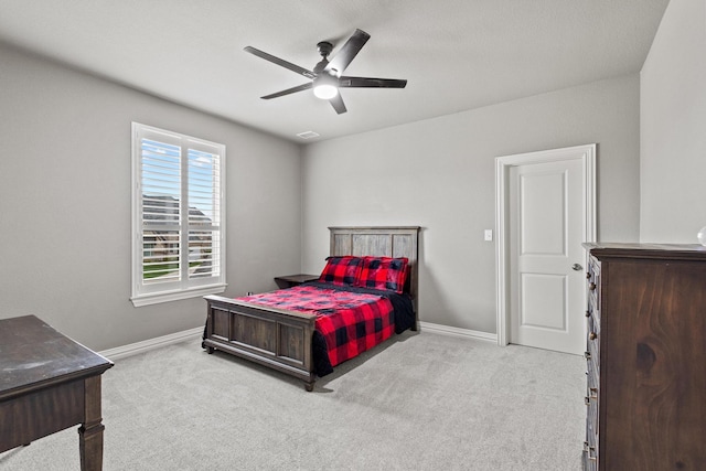 3723 Parkwood Ln, Denison, TX 75020 - bedroom with carpet floors, baseboards, and ceiling fan