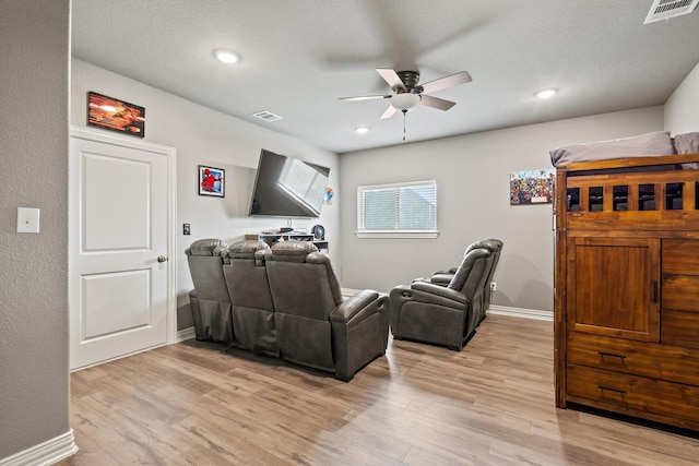 3723 Parkwood Ln, Denison, TX 75020 - cinema with a ceiling fan, light wood-style floors, baseboards, and recessed lighting