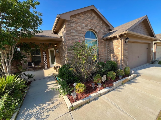 328 Foxhunter St, Fort Worth, TX 76131 - ranch-style home with brick siding, a garage, and driveway