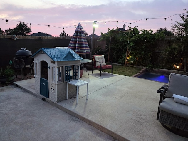 328 Foxhunter St, Fort Worth, TX 76131 - fenced backyard with a patio