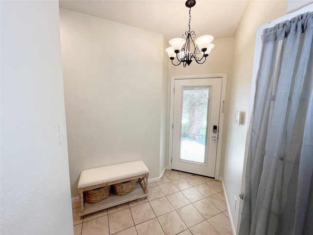 328 Foxhunter St, Fort Worth, TX 76131 - entryway with a chandelier, light tile patterned flooring, and baseboards