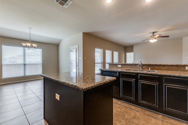 905 Ridge Dr, Little Elm, TX 75068 - kitchen featuring dishwasher, a sink, plenty of natural light, a kitchen island, and recessed lighting