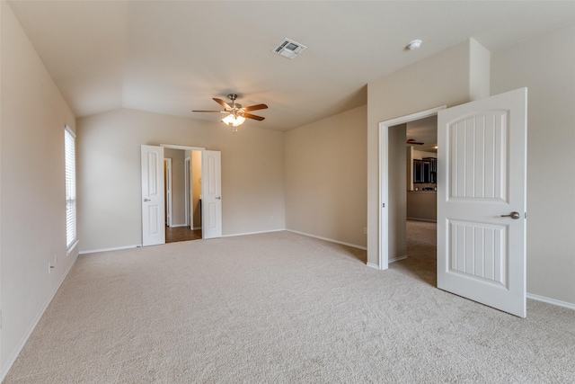 905 Ridge Dr, Little Elm, TX 75068 - unfurnished bedroom with carpet flooring, baseboards, and a ceiling fan