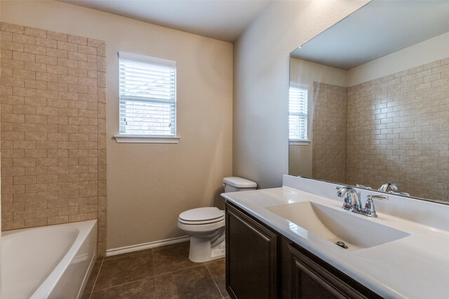 905 Ridge Dr, Little Elm, TX 75068 - full bath featuring vanity, tile patterned floors, toilet, and baseboards