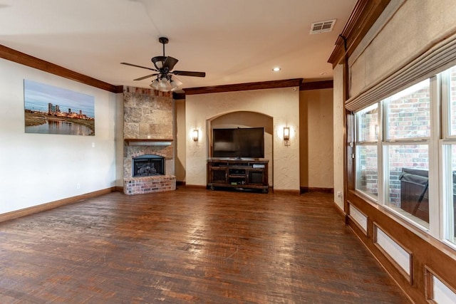 1235 Meredith Creek Ln, Fort Worth, TX 76179 - unfurnished living room featuring crown molding, a ceiling fan, a large fireplace, wood finished floors, and baseboards