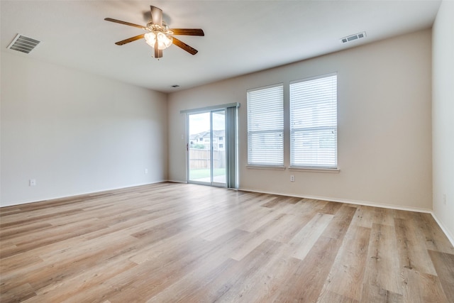 5132 Senator Dr, Fort Worth, TX 76244 - empty room with a ceiling fan, light wood finished floors, and baseboards