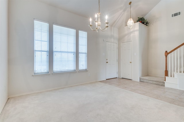 5132 Senator Dr, Fort Worth, TX 76244 - carpeted entryway with a chandelier, stairs, and tile patterned floors