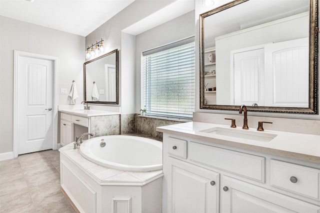 768 Telemark Trl, Frisco, TX 75036 - bathroom with a bath, two vanities, and tile patterned floors