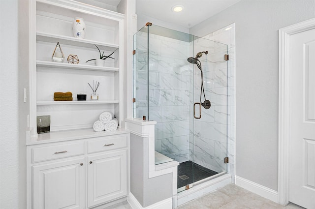 768 Telemark Trl, Frisco, TX 75036 - bathroom with a marble finish shower, tile patterned floors, and baseboards