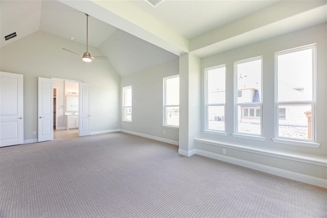2207 Morris St, Rockwall, TX 75087 - spare room with light carpet, a ceiling fan, baseboards, and high vaulted ceiling